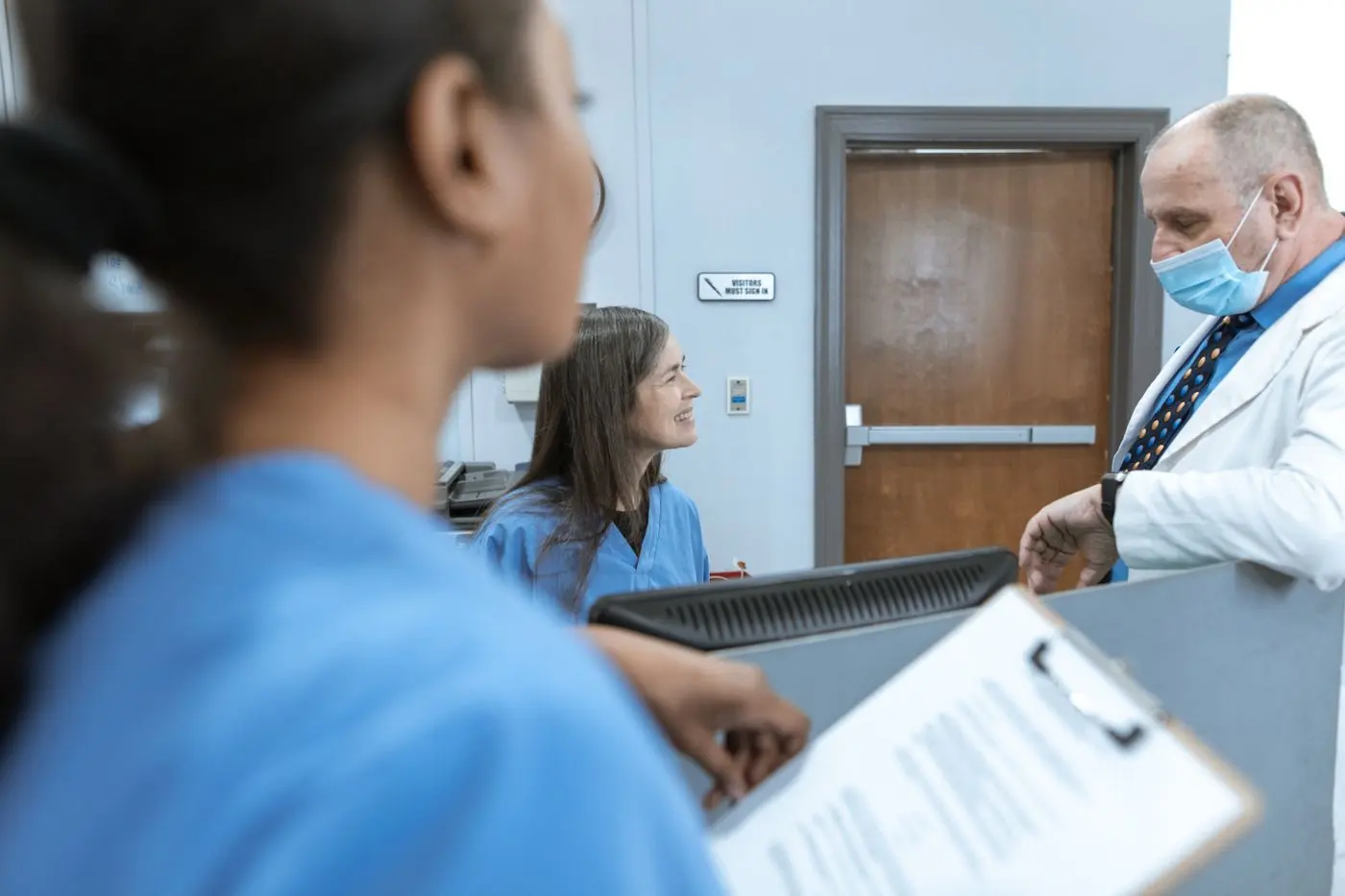 Doctor talking with a patient
