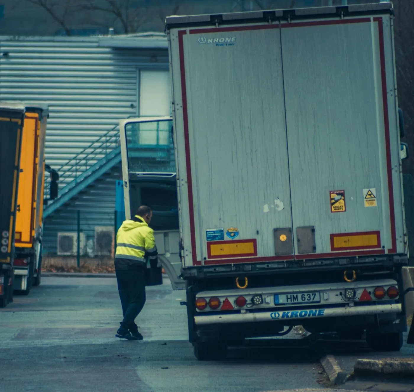 Warehouse with parcels and a delivery vehicle